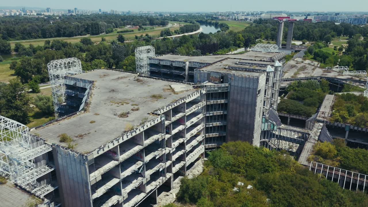 derelict hospital complex in Blato with city and river in the distance