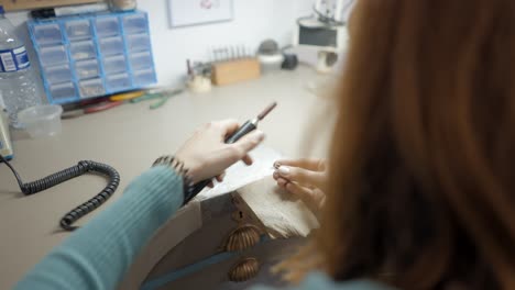 jeweler working on a piece of jewelry