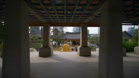 approaching three buddha statues