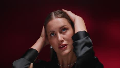 woman portrait against red background