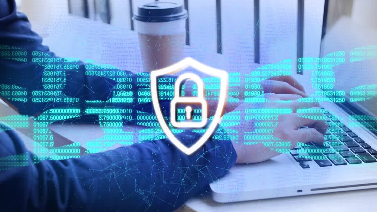 Man typing on laptop initiating globe and code overlays for security, shield pulsing, pulling back