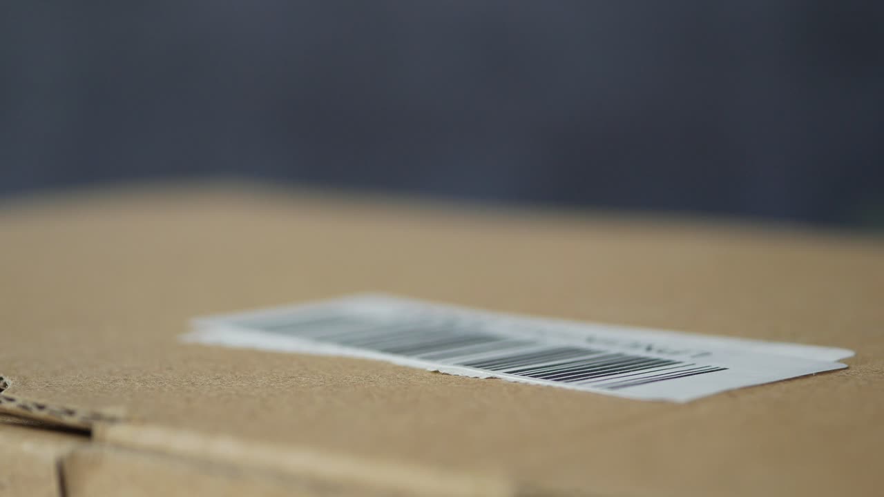 Close-up of a barcode on a cardboard box
