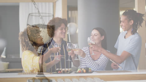 Animation-of-glass-of-wine-over-diverse-friends-having-drink-in-bar