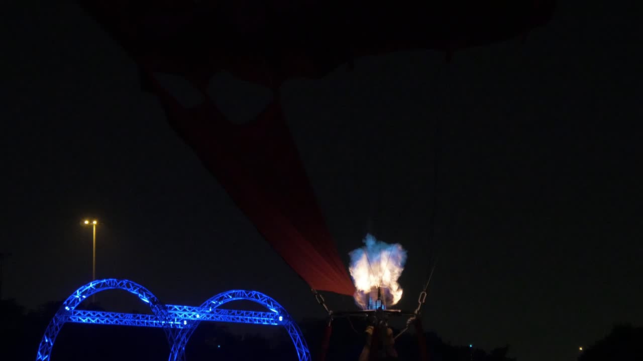 Hot Air Balloon Filling Up With Hot Air For Lift Off. Air Travel For The Tourist .