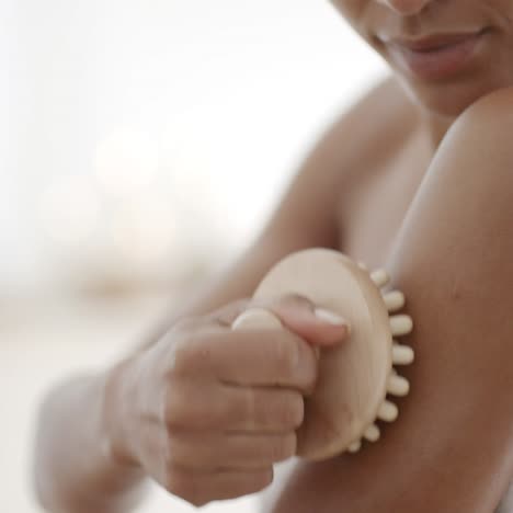 woman massaging hand in spa