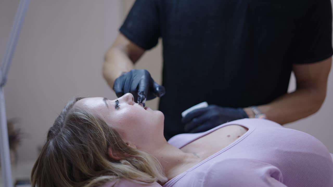Client Undergoing a Beauty Treatment in a Salon