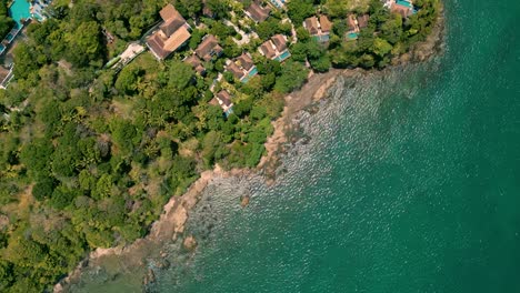 4K-Cinematic-nature-drone-footage-of-a-panoramic-aerial-view-of-the-beautiful-beaches-and-mountains-on-the-island-of-Koh-Lanta-in-Krabi,-South-Thailand,on-a-sunny-day