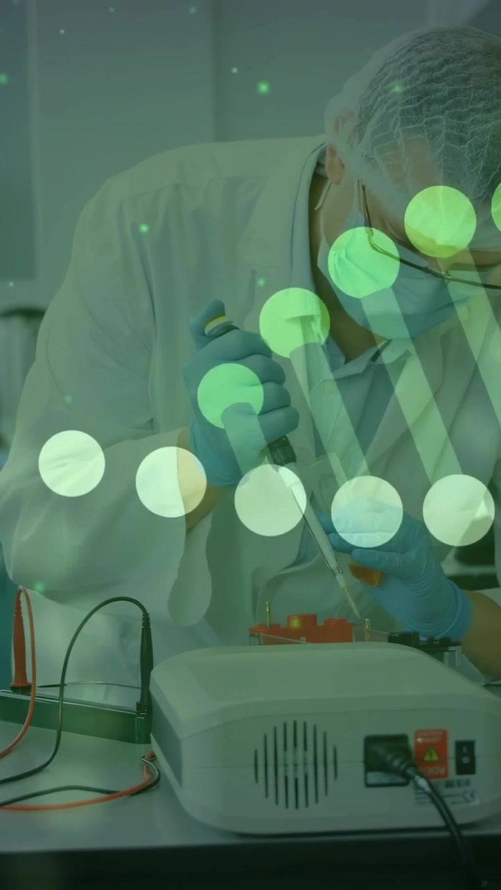 Vertical video: Tech pressing pipette, pipetting plate for assay with green DNA overlay over tech