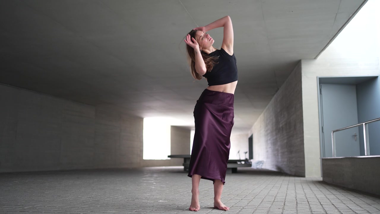 The elegant and captivating dance movements in beautiful minimalist inspired architecture