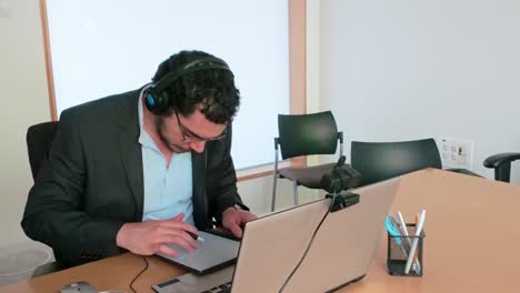 keeping project on track: man with tablet
