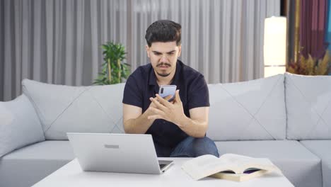 Young-man-with-phone-charging-problem.