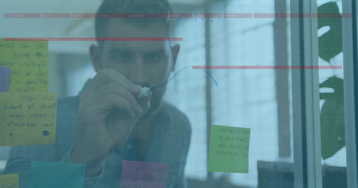Animation of data processing over caucasian businessman taking notes