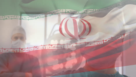 animation of flag of south iran waving over surgeons in operating theatre