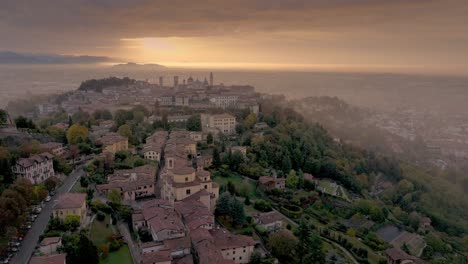 long aerial shot of bergamo alta during an enchanting light situation