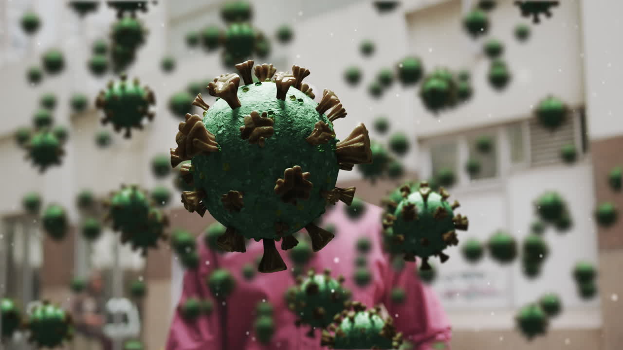 마스크를 쓰고 있는 사람 위의 매크로 코로나 19 세포의 애니메이션