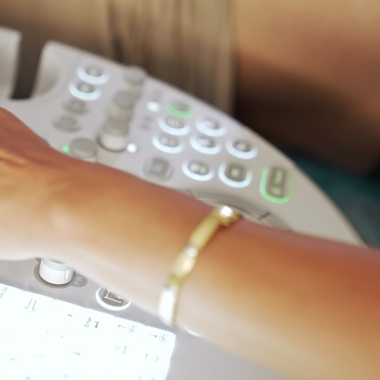 Doctor's hands operating the modern equipment in hospital. Close up. Medic pressing the buttons and turning the handles