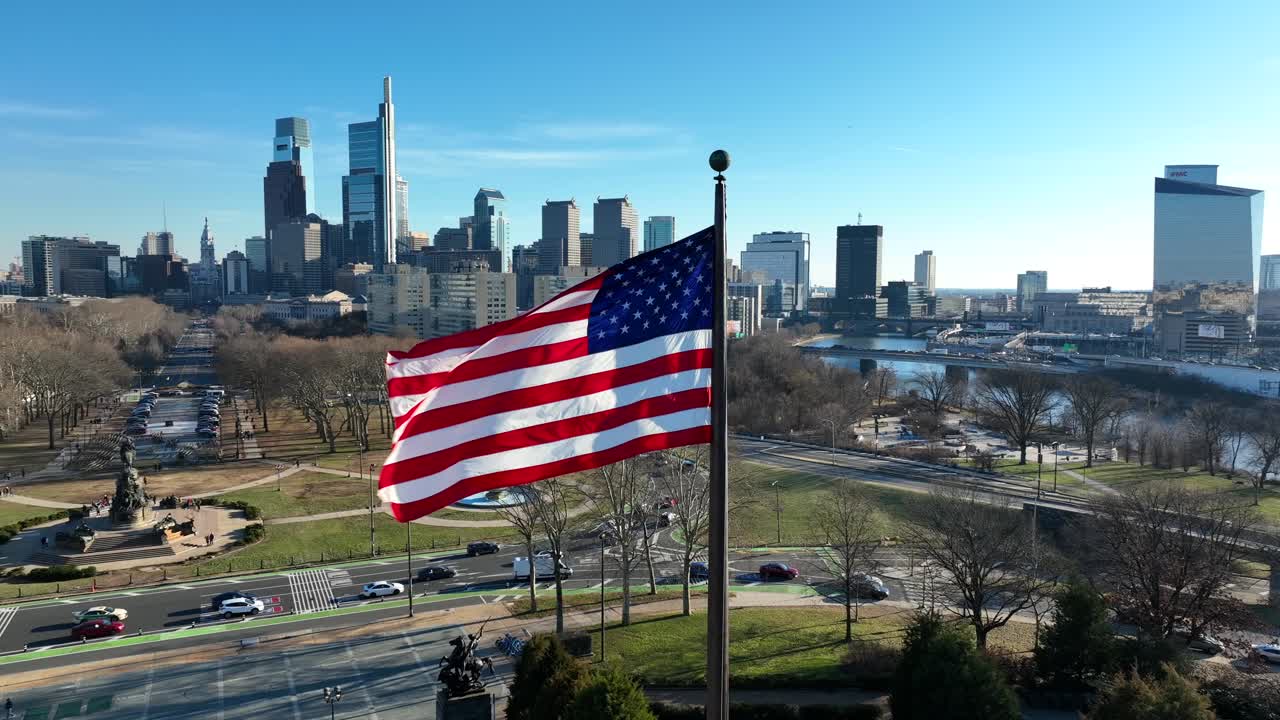 bandera de estados unidos con el horizonte metropolitano de philly