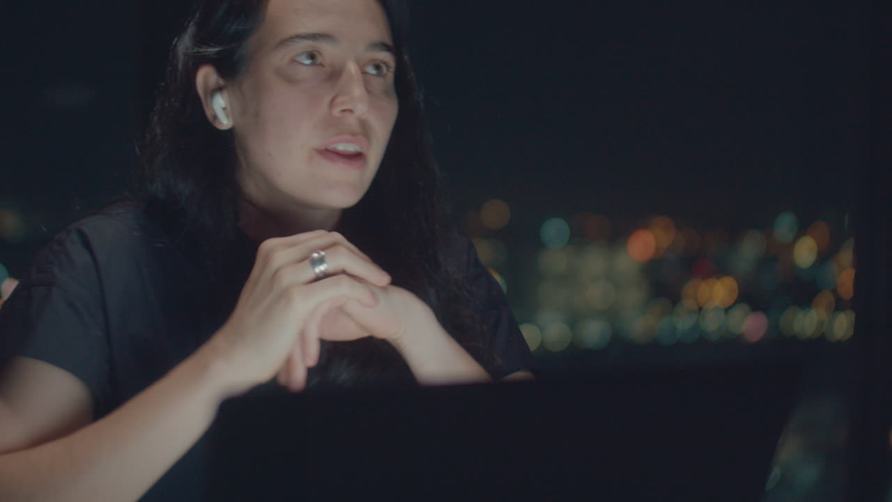 White woman have video call late night