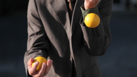 The-man-was-effortlessly-juggling-3-balls-in-the-afternoon