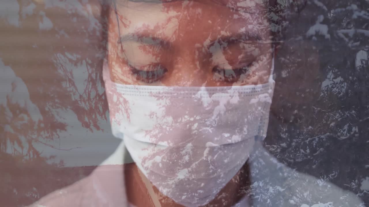 Animazione di una donna che indossa una mascherina su uno sfondo invernale