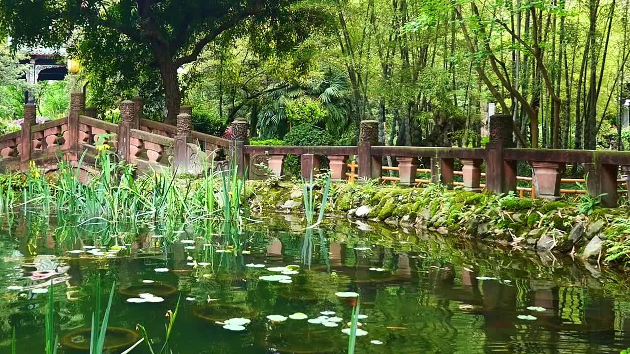 Ancient Chinese village recreation with pond