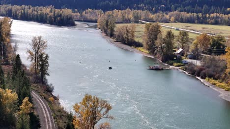 aerial perspectives of thompson river with cable ferry in fall beauty