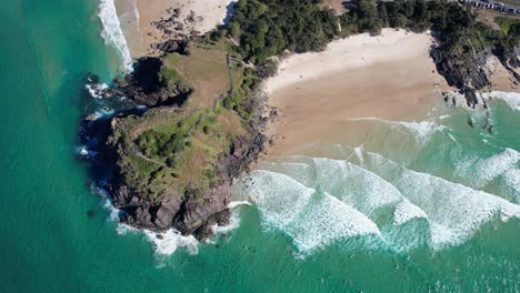 waves splashing at norries cove near norries headland in cabarita beach, nsw, australia