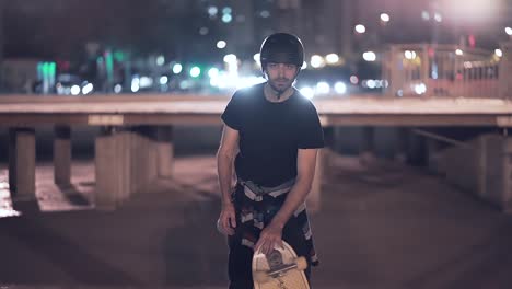 man skateboarding at night