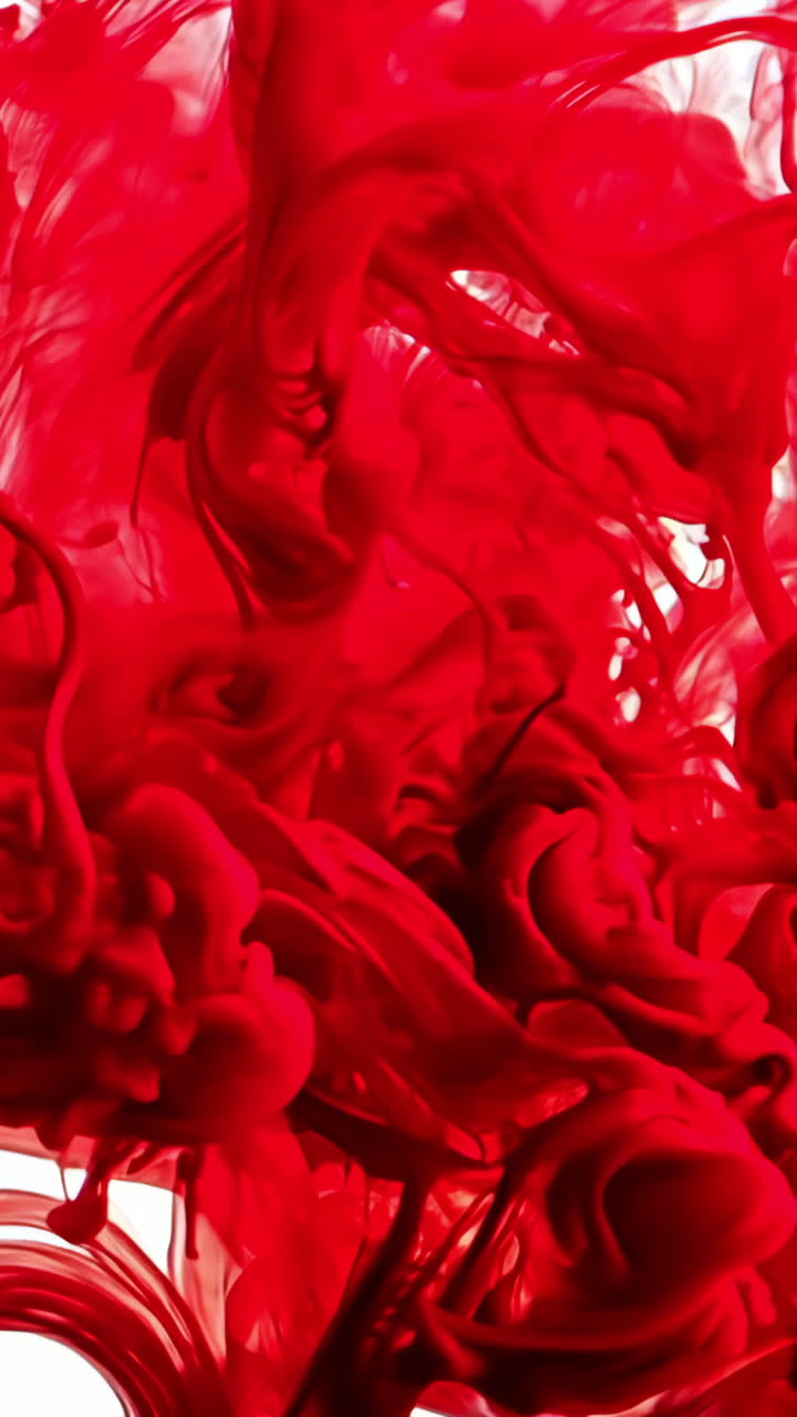 A red smoke trail is flowing across a white background. The smoke is thick and he is coming from a fire. Concept of danger and chaos, as the smoke seems to be spreading rapidly and uncontrollably