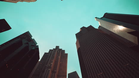 looking up at the skyscrapers in a city