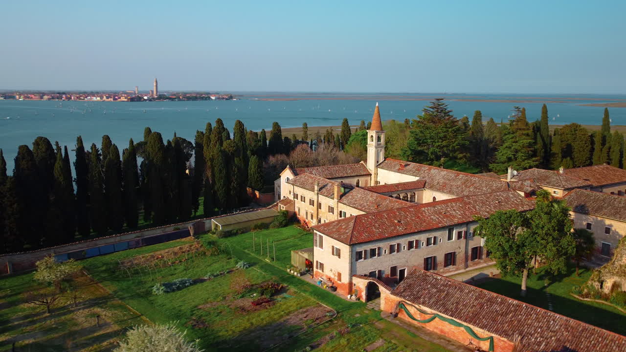 Monastery of San Francesco del deserto in Venice. Venice lagoon seen from above with drone. Island of San Francesco del deserto, Burano, Murano, Torcello.