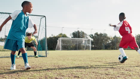 kids playing soccer on a field