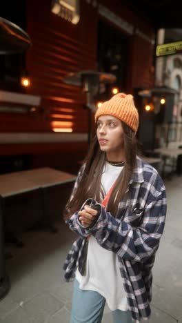 young woman walking outdoors