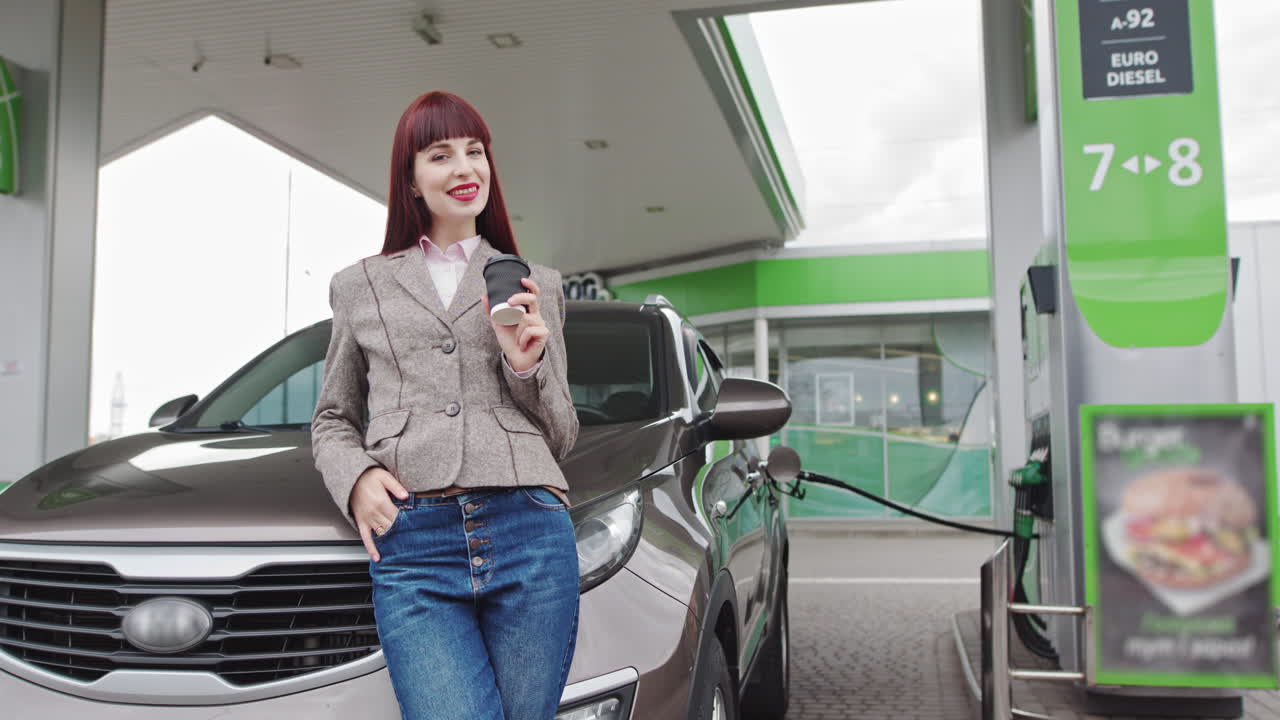 Woman with Coffee at Gas Station
