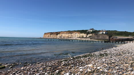 View-from-a-stoney-beach-looking-a-coastal-town-on-the-south-coast-of-England