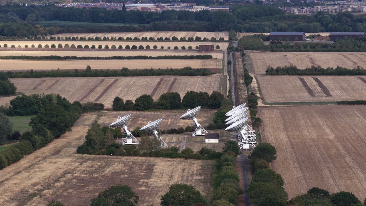 Radio Telescope Dishes At Cambridge University's Mullard Observatory - Mullard Radio Astronomy Observatory In England, UK. Aerial Shot