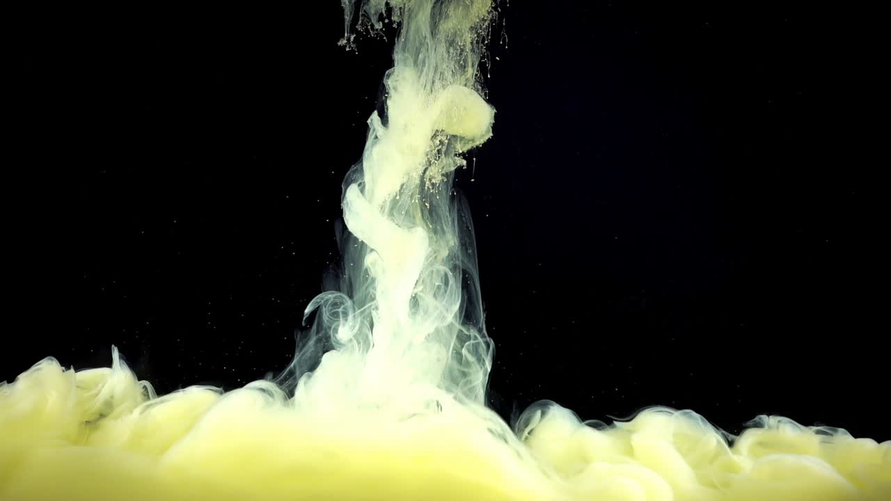 Paints. Abstract forms. Shooting on a black background