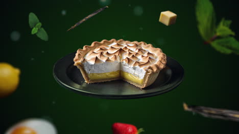 lemon meringue pie with a missing slice animation intro for advertising or marketing on green backgroun for restaurants with the ingredients of the dessert flying in the air - add price or sale