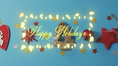 Animation-of-happy-holidays-text-over-christmas-decorations