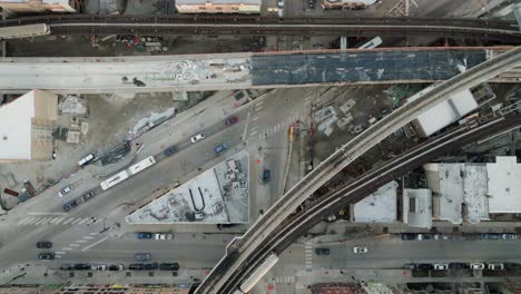 fixed aerial view above of a trains on a elevated rails, in chicago, usa - cenital, drone shot