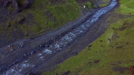 Water-Flowing-in-The-River-Near-Seljavallalaug-Outdoor-Swimming-Pool-In-Iceland