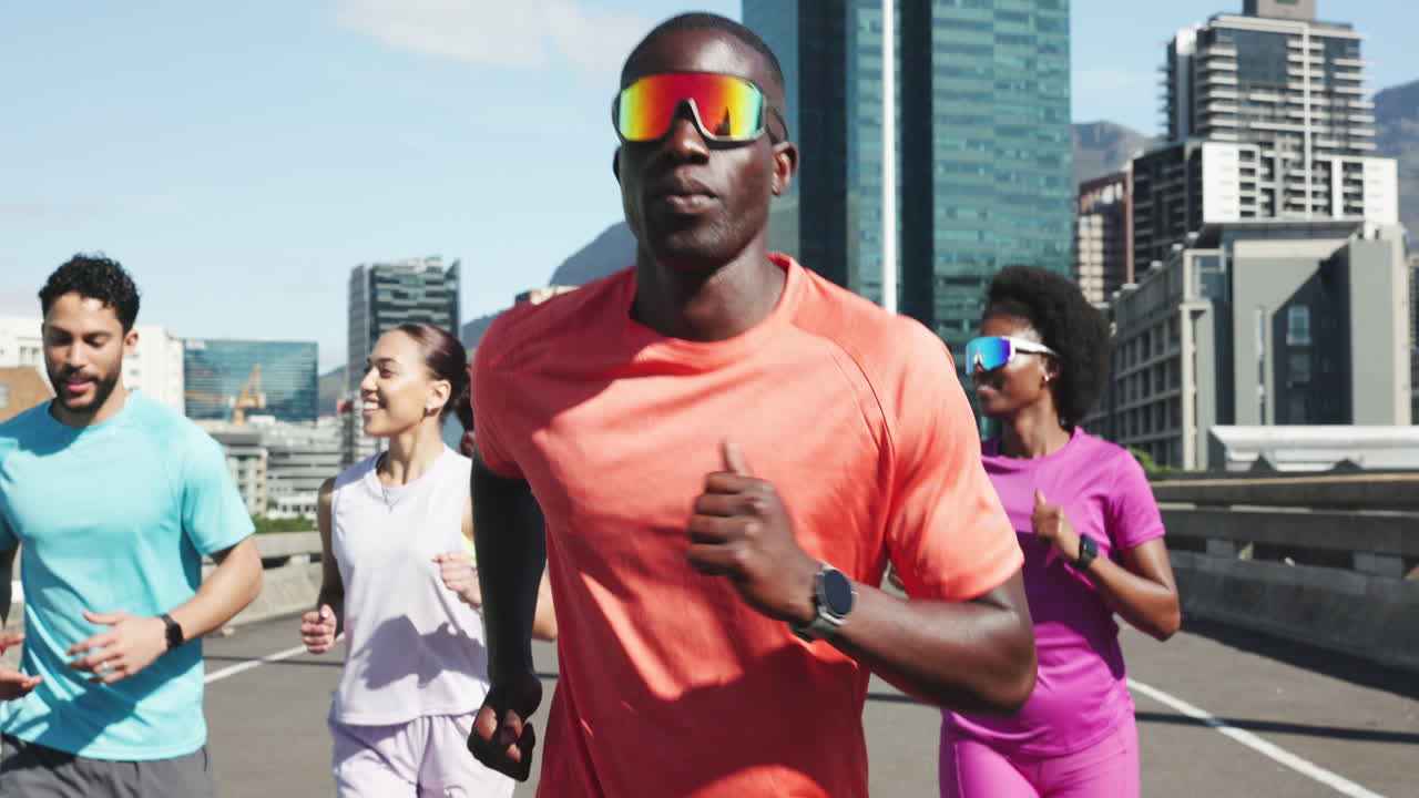 Group of Diverse People Running Together on a City Street