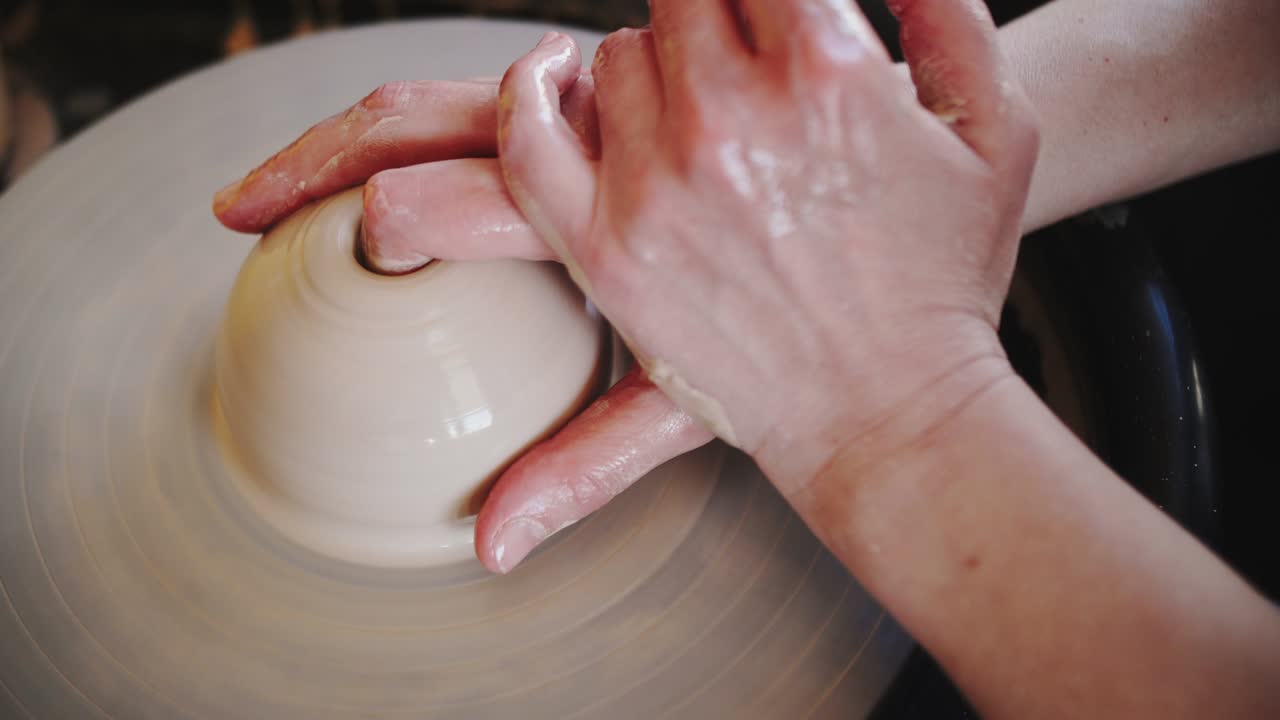 footage of pottery wheel work