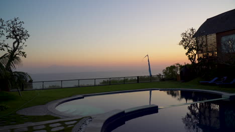 sunset at a luxury bali villa with ocean view