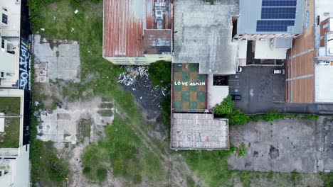 Drone-aerial-bird's-eye-view-of-abandon-derelict-building-block-Gossy-Good-Times-Gosford-CBD-tourism-travel-Australia-Central-Coast-4K