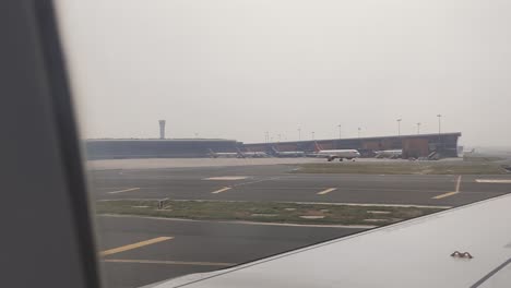 a running shot of a plane taking off from the runway