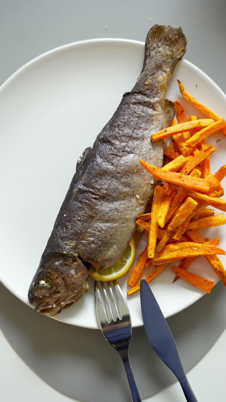 Slovenian river trout and sweet potato fries combination