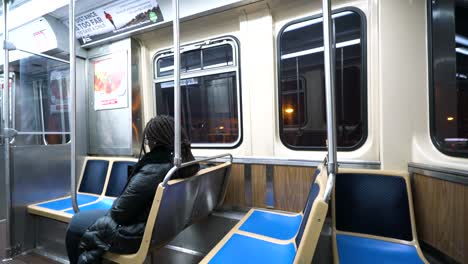 Static-shot-of-person-riding-subway-train-in-downtown-Chicago