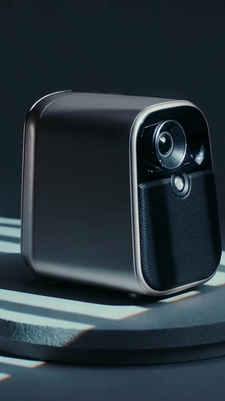 Vertical video: Orbiting camera revealing metal device lens and grille on pedestal, striped slats