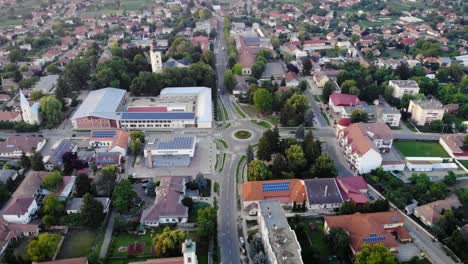 aerial view of a european town with solar panels on buildings